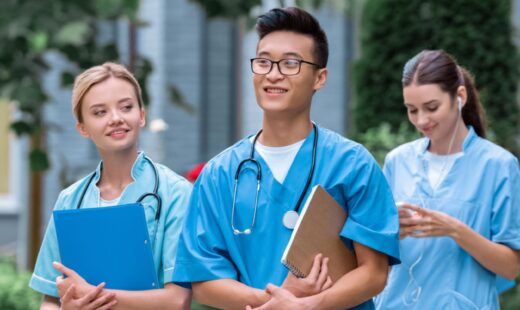 Multicultural nurses walking to class